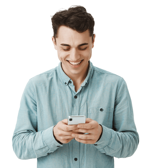 Person standing with phone in hand.